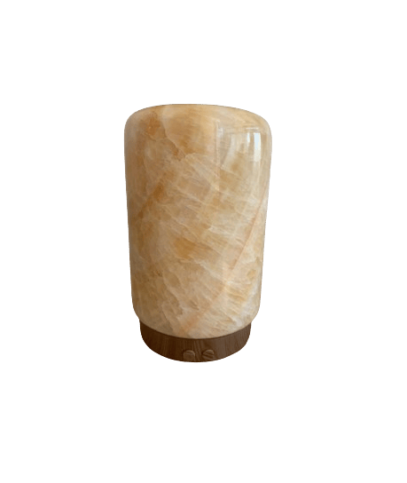 a marbled object on a black background